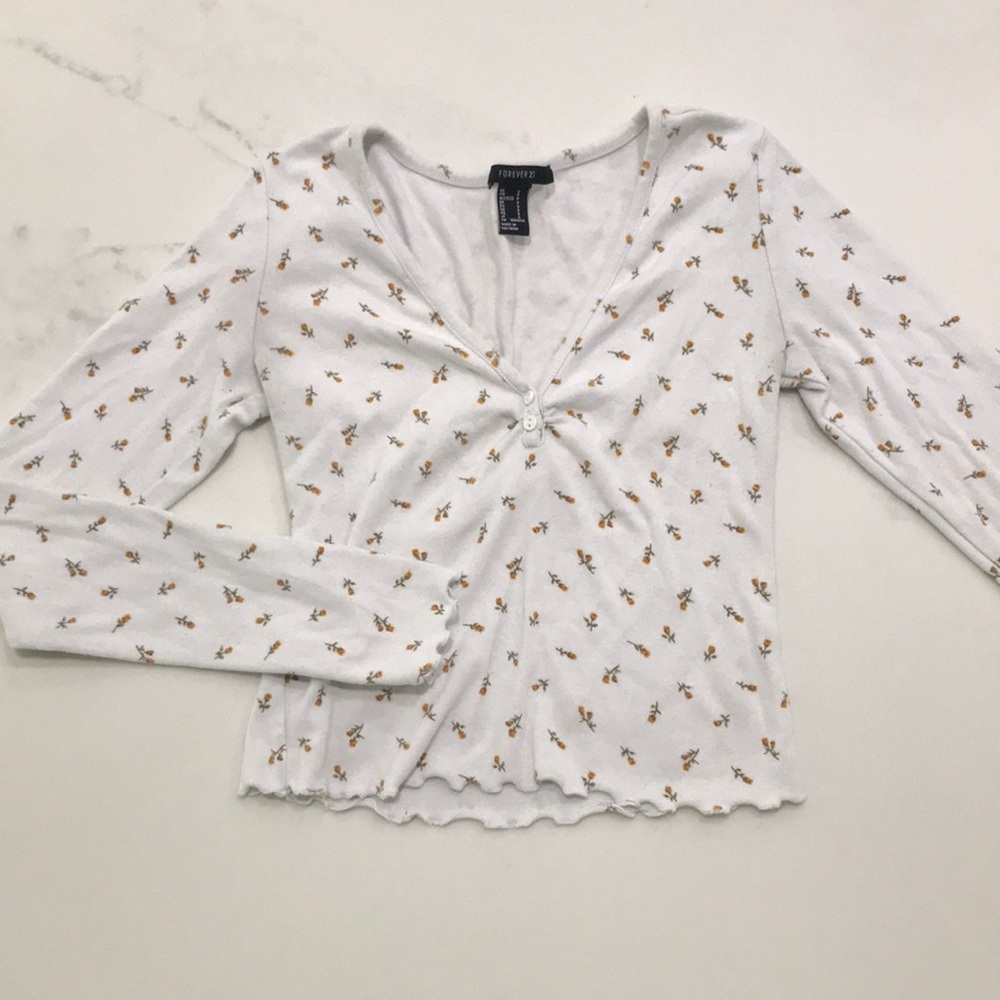 Cropped long sleeve floral top